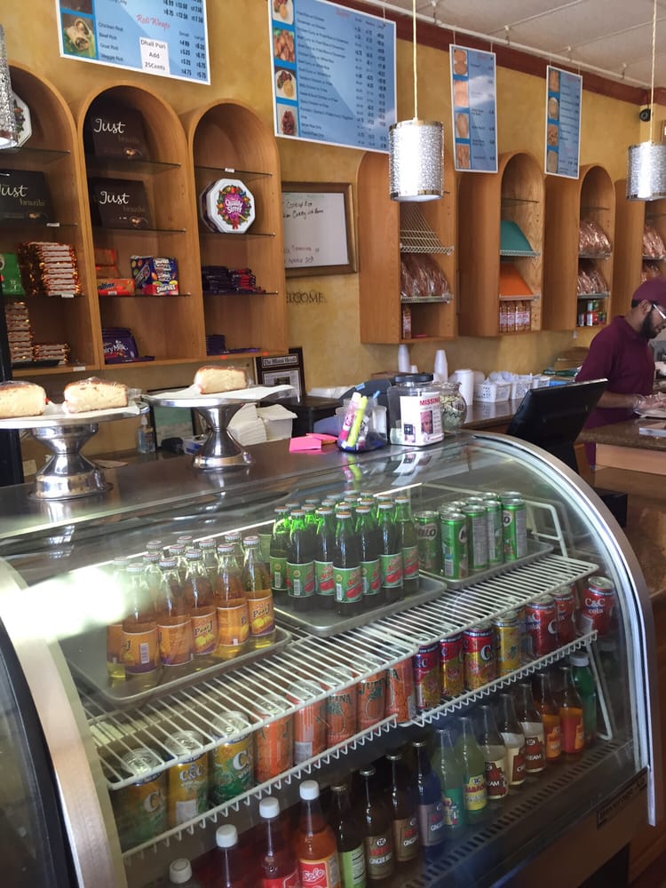 ABOUT US Sheiks Bakery & Roti Cafe