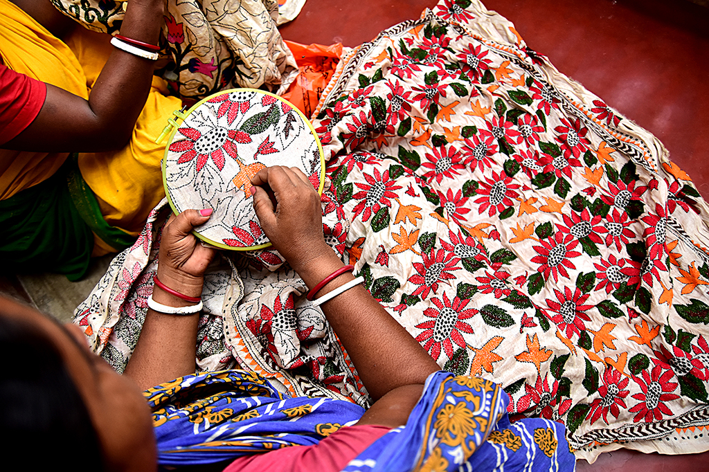 SHE is an NGO focused towards revival of Kantha a traditional craft