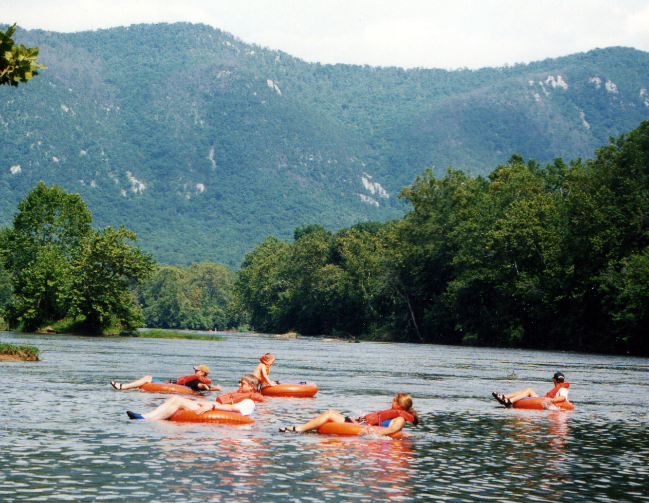 The Massanutten mountains to your left Shenandoah River Tubing