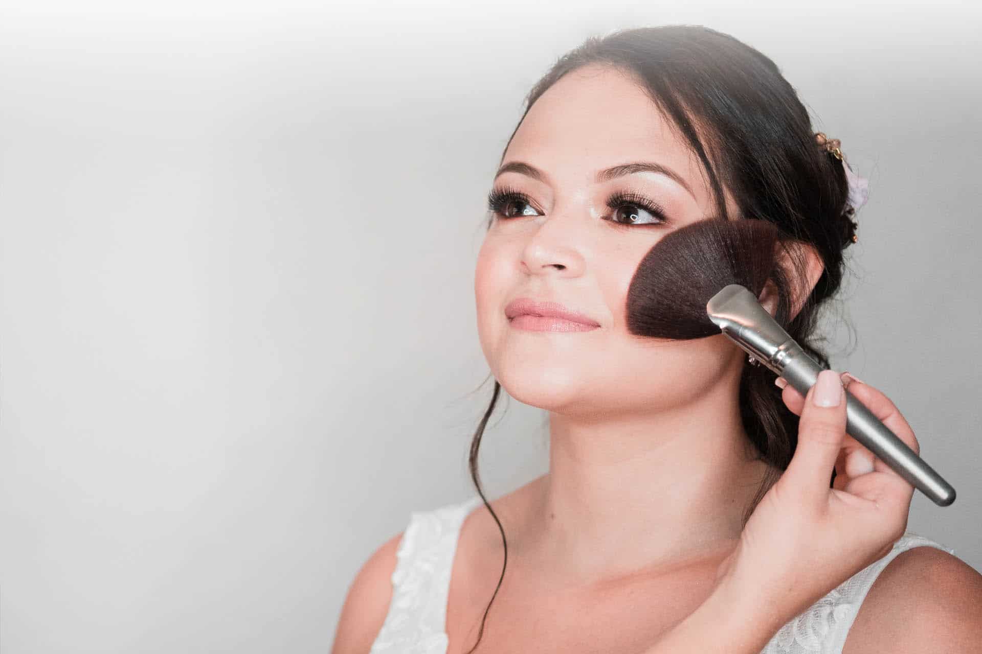 bride_getting_makeup_done Ship Our Wedding DIY Rentals