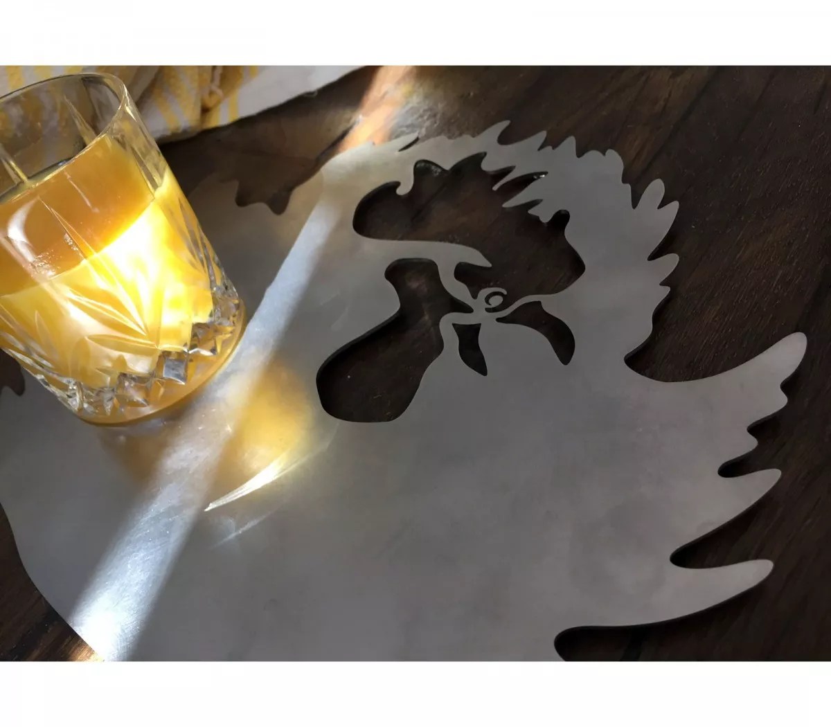 Large decorative metal trivet for centerpieces and kitchen.