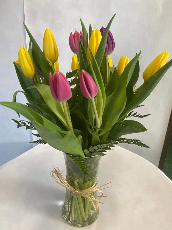 Fresh Cut Tulips in Clear Vase