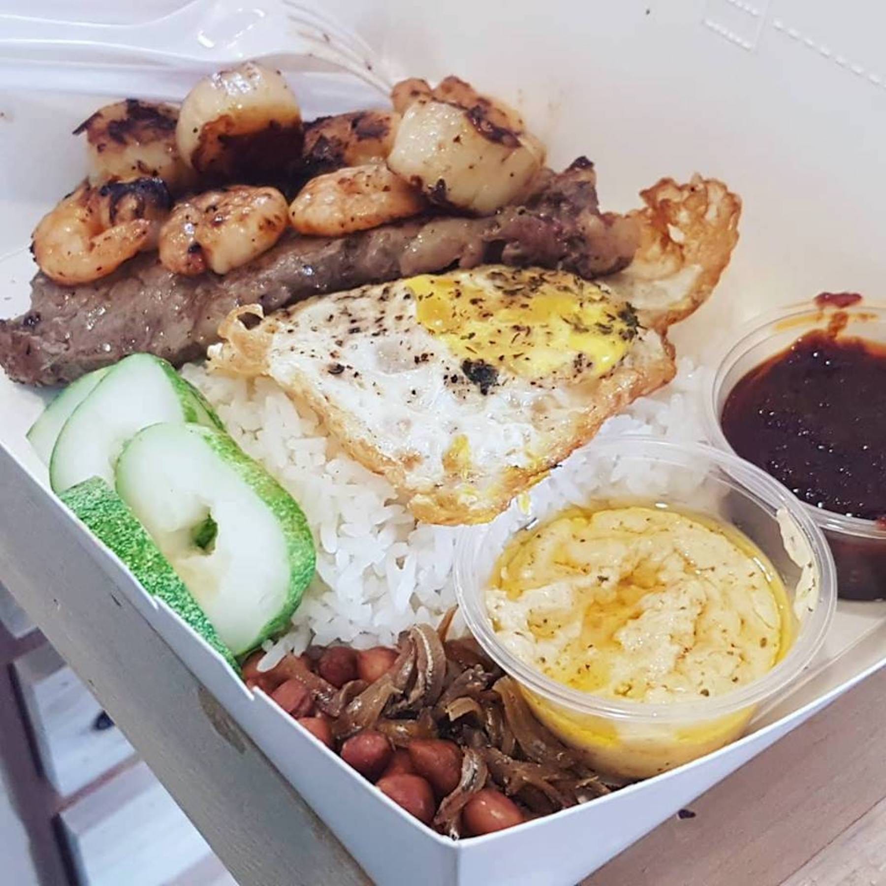 This AustralianOwned Nasi Lemak Stall Nasi Lemak Topped With Ribeye