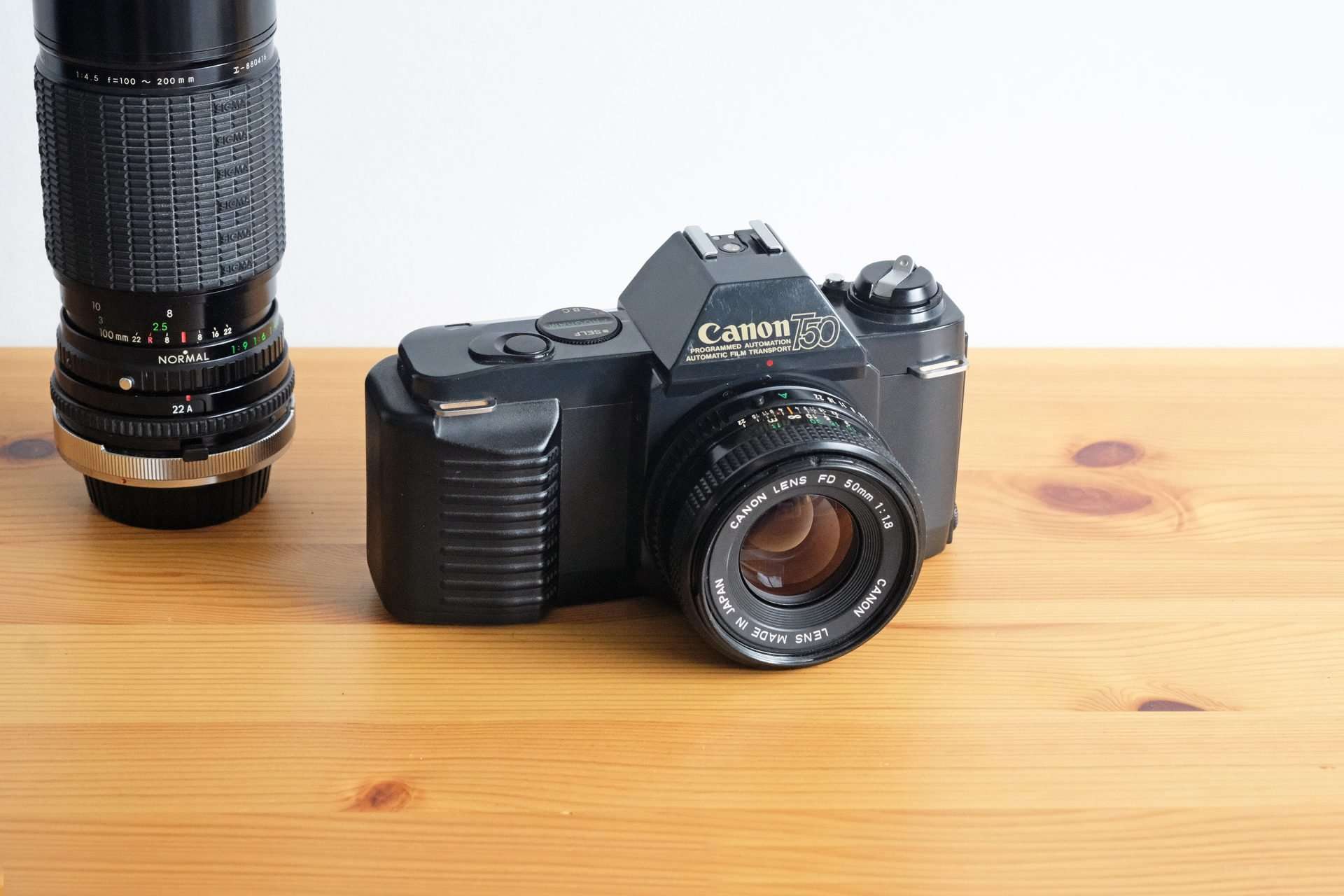 Canon T50 Film Camera + 50mm f/1.8 & Zoom Lenses Buy Online at Shutteroo