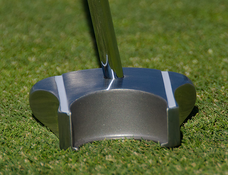 Golfers how to putt with the side saddle putting technique.