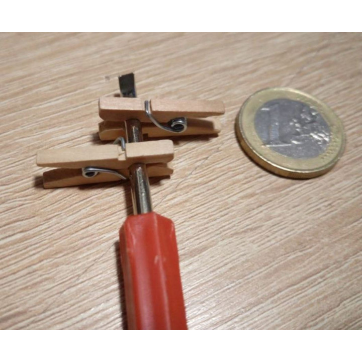 Small decorative clothespins for creating garlands from photographs or