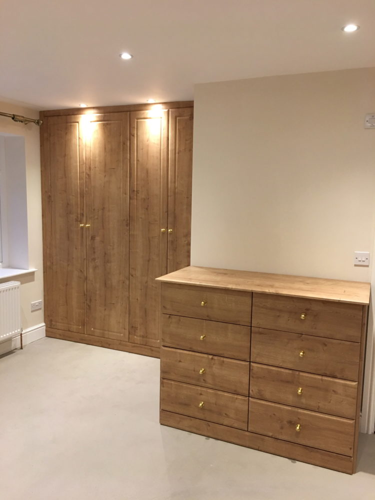 Simply Fitted Wardrobes Oak fitted bedroom Essex.