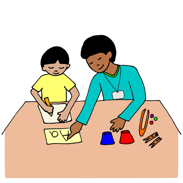 a teacher and student working together at a table.