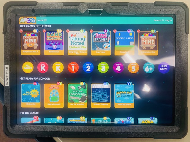 The ABCya.com home screen is shown on an iPad.