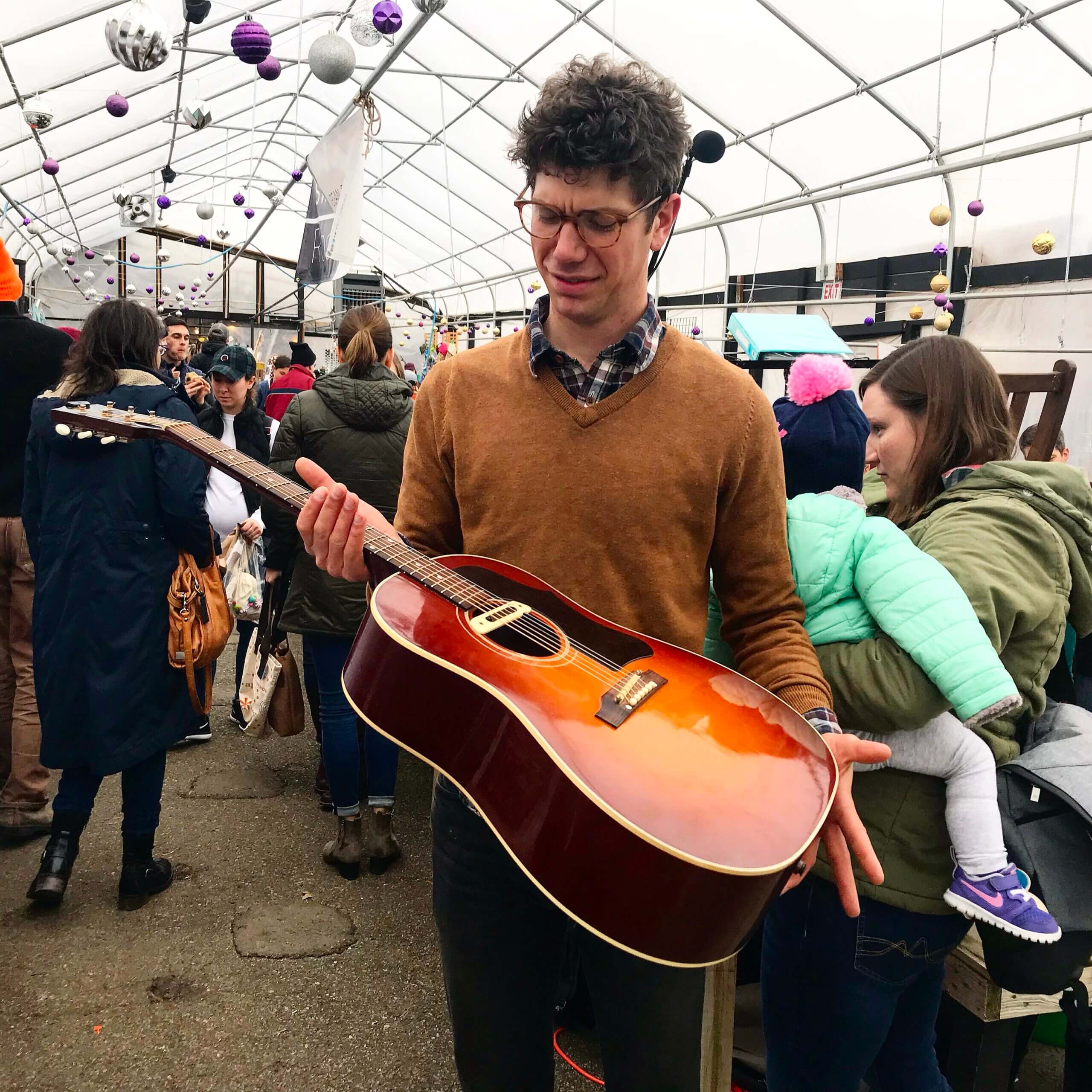 Mail Carrier/Musician Delivers Goodwill to Simpson Simpson Housing Services