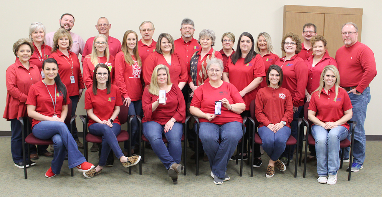 SRE Employees Wear Red to Recognize Deployed Military Singing River