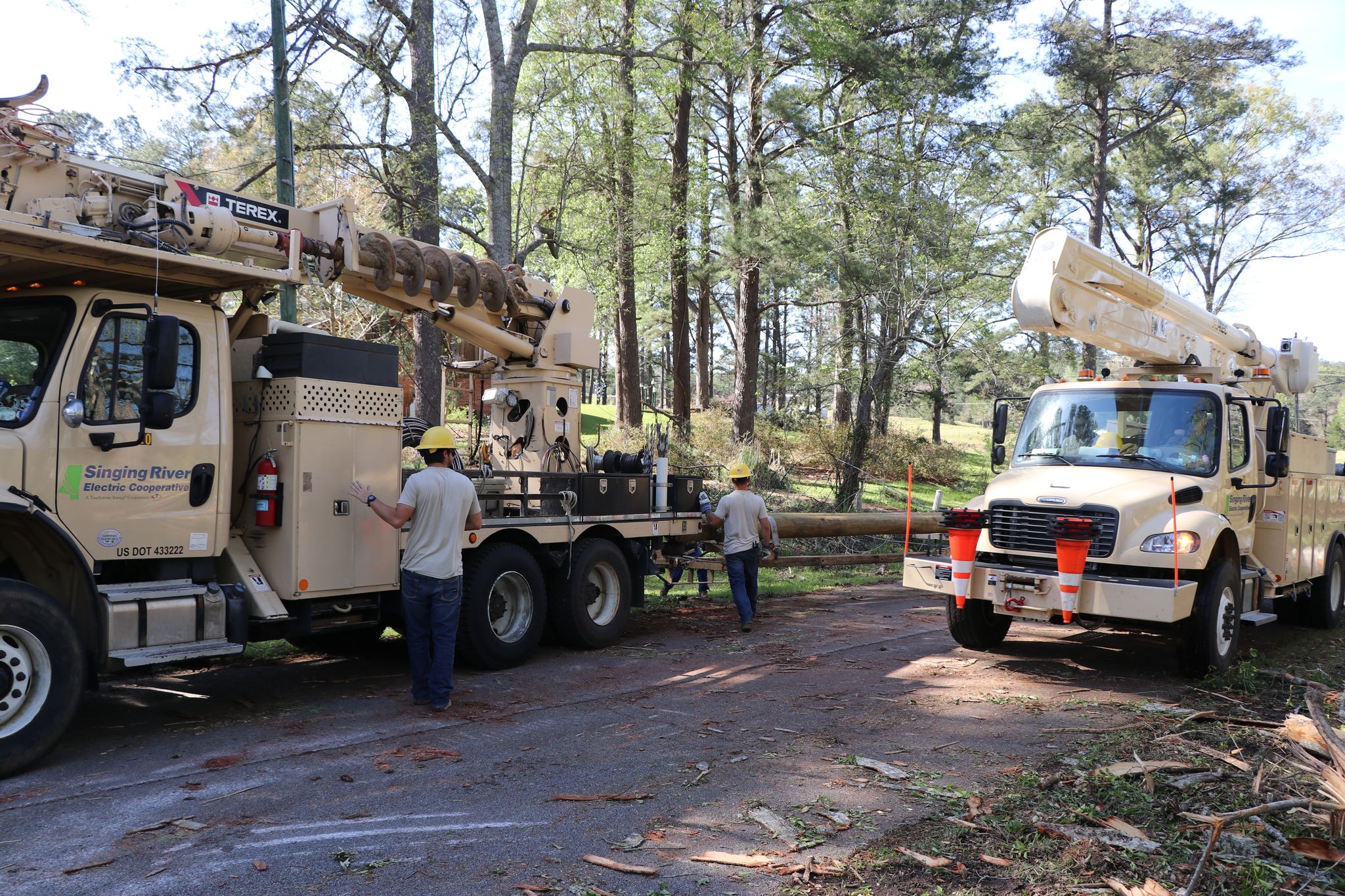 Singing River Electric sends linemen to East Mississippi Electric to