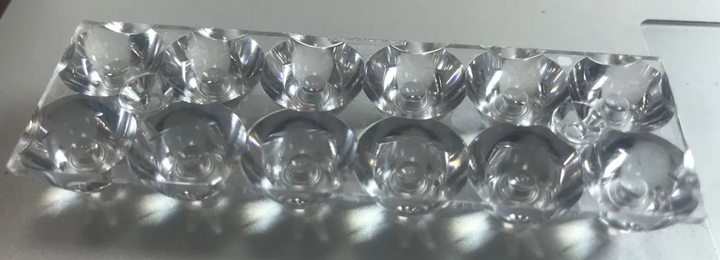 Optical molded plastic lens and LED condenser Sinoptix