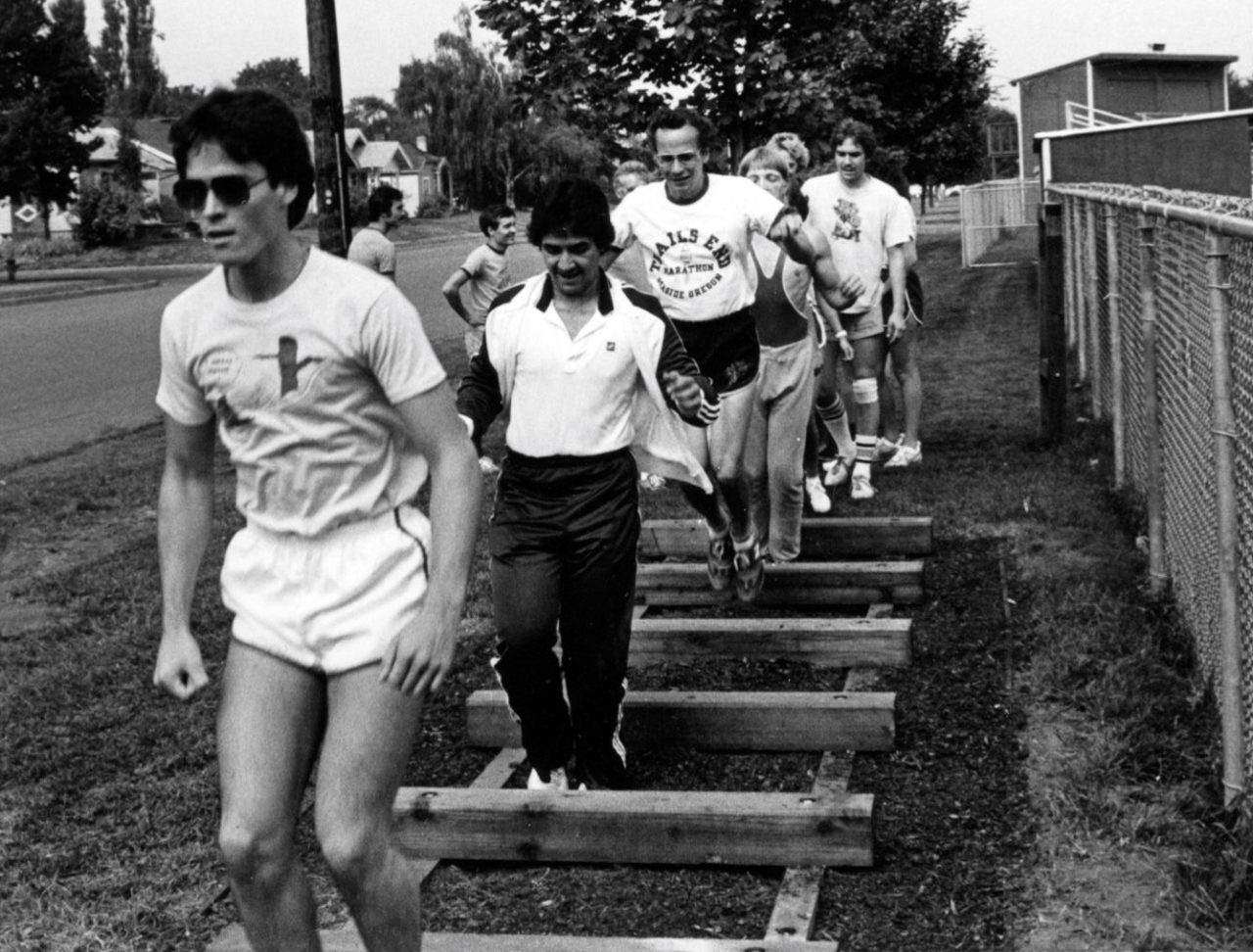 Six individuals jumping on the log-hop course.