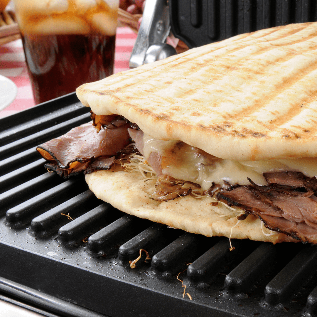 How Do I Properly Clean And Maintain A Panini Press For Making Grilled Sandwiches? Sizzlenook