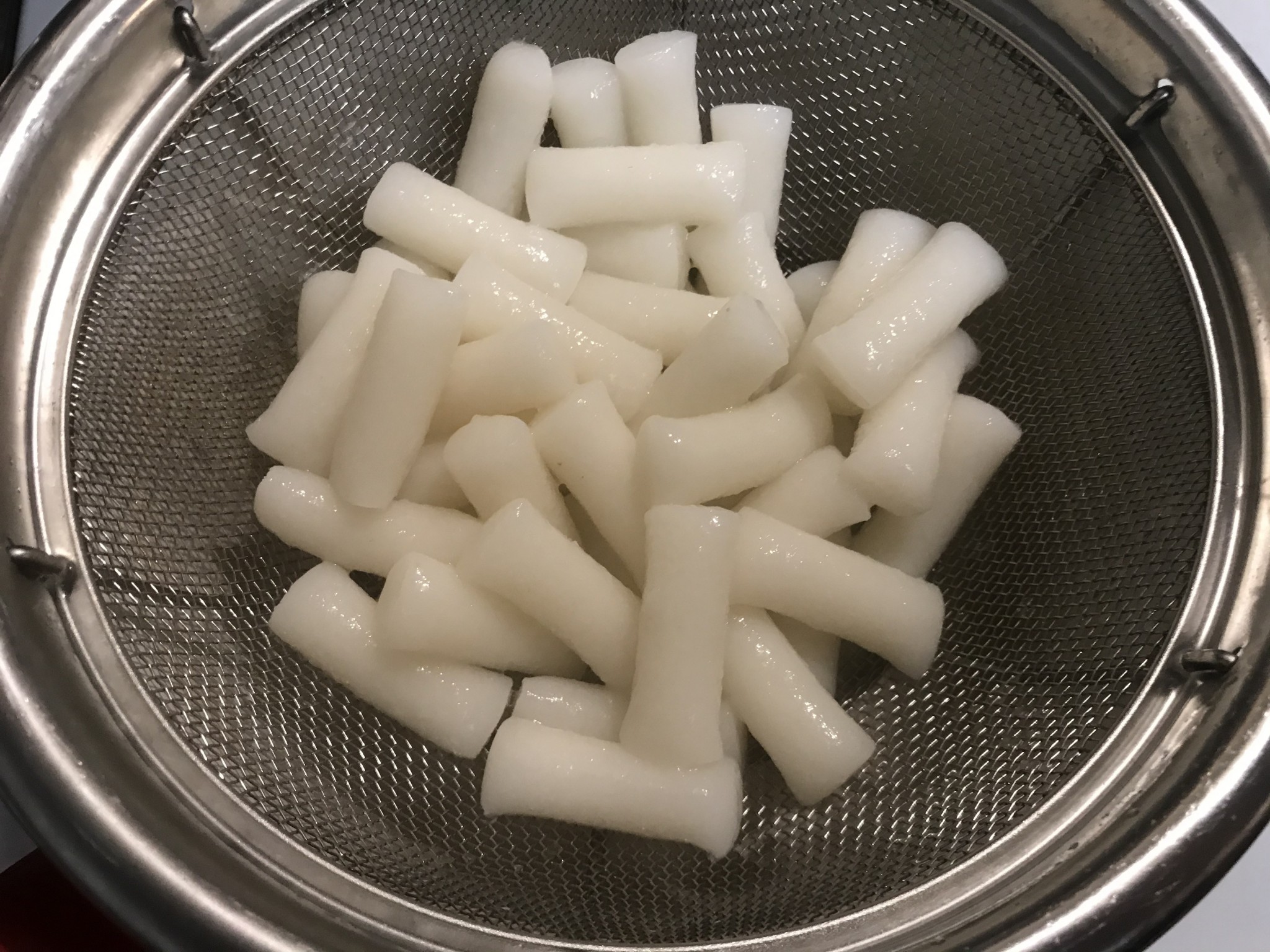 Korean Spicy Soup Noodles and Rice Cakes with Seafood S&J Menu