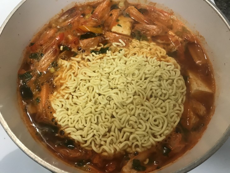 Korean Spicy Soup Noodles and Rice Cakes with Seafood S&J Menu