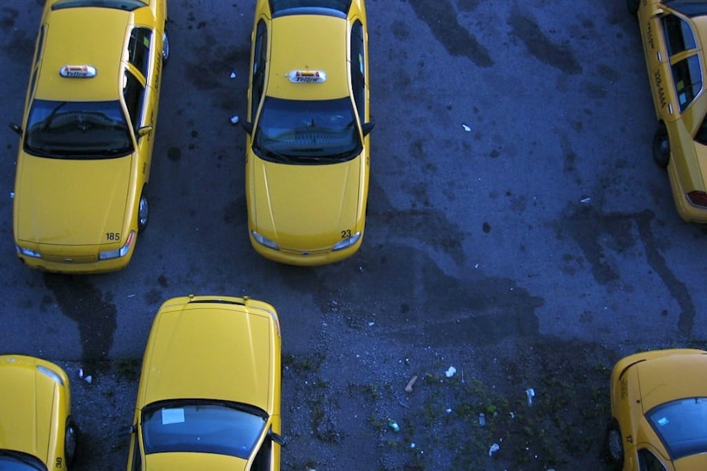 Business travelers turn to taxis due to car rentals' rising prices