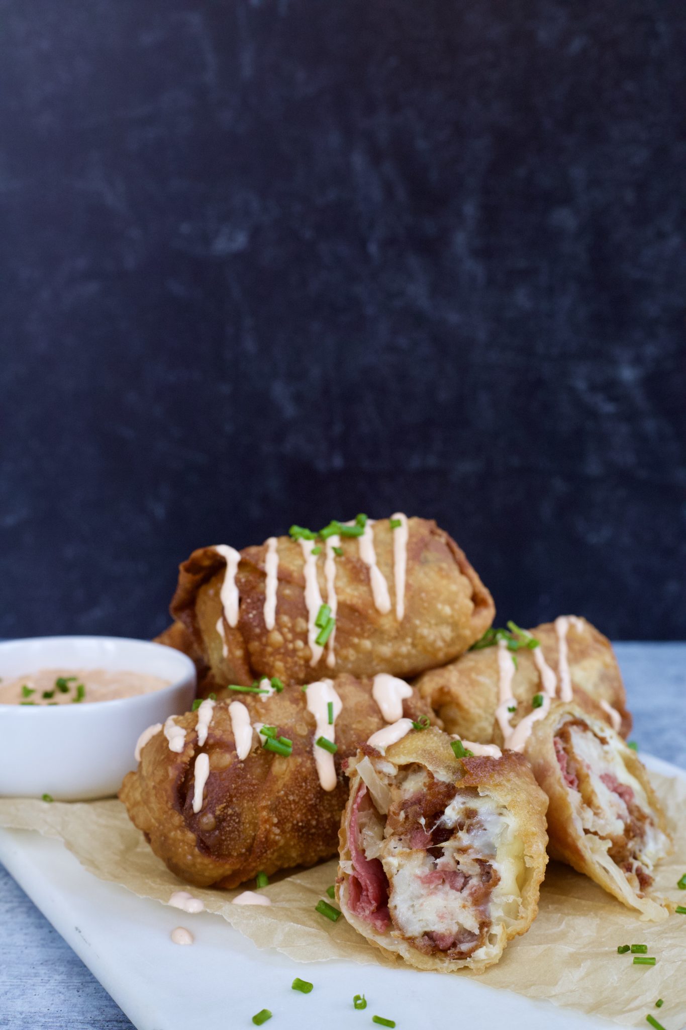 Tater Tot Stuffed Corned Beef Reuben Egg Rolls Slice of Jess