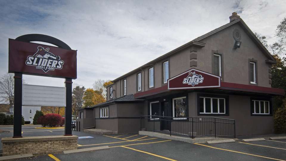 History of Sliders Grill & Bar Fresh Wings, Live Sports & Family Fun