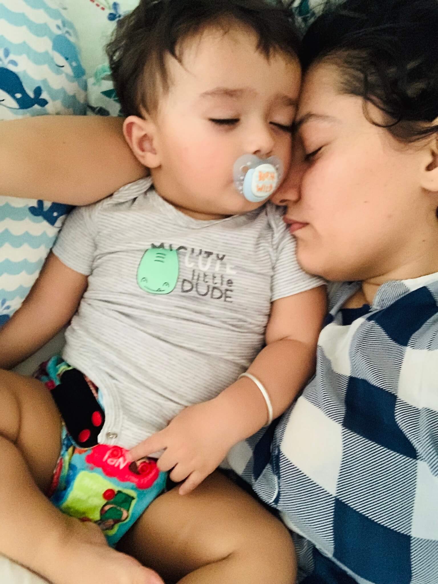 Baby Sleeping with Mom