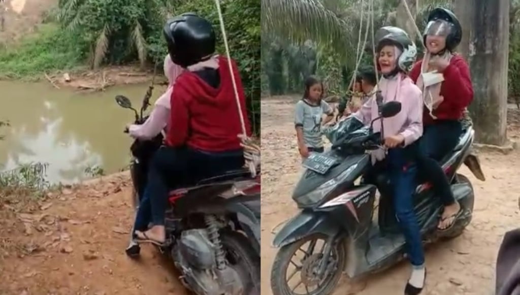 Wuih, Dua Wanita Ini Nekat Naik Motor Seberangi Sungai