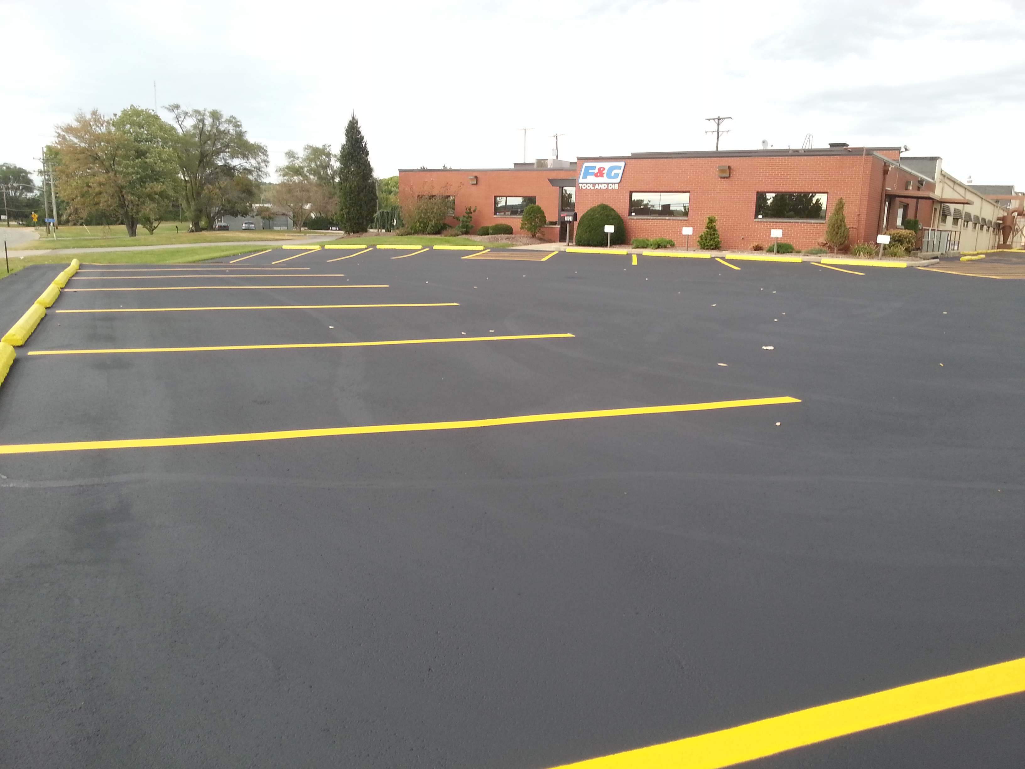 Parking Lot Sealcoating Smith & Sons Sealcoating & Striping Inc.
