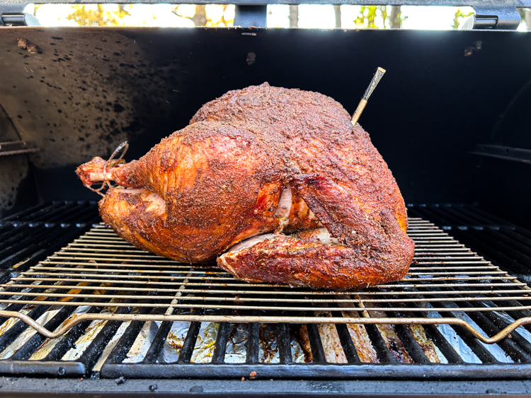 cajun turkey in the smoker