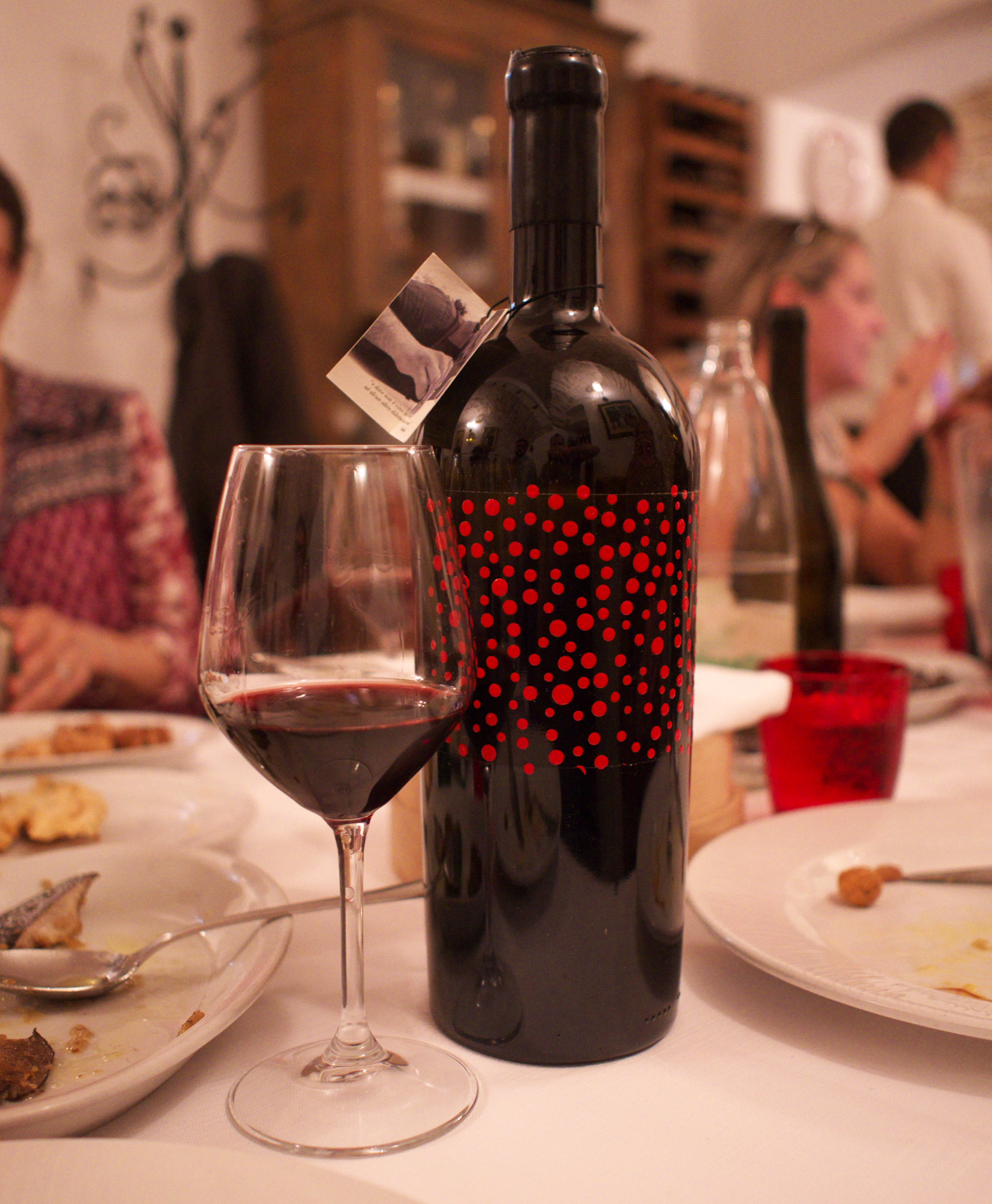 Magnum bottle and glass of 2016 Chakra Rosso from Giovanni Aiello - 100% Primitivo