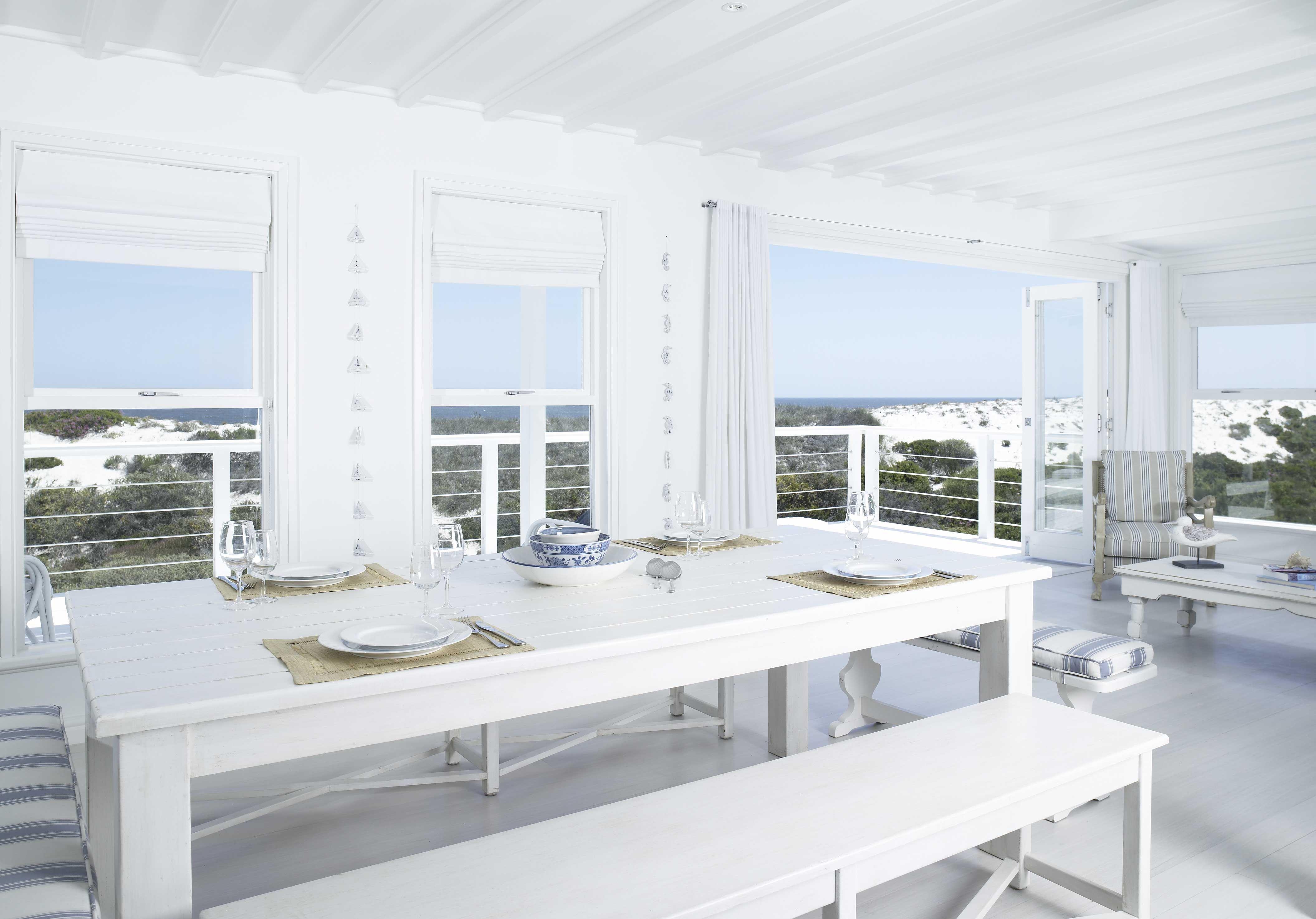 Situated on the beach and connected by a private boardwalk