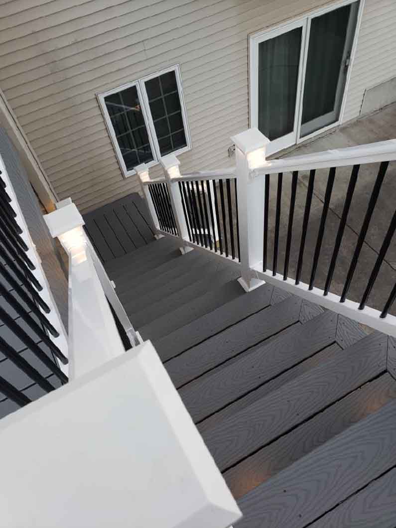 Trex Decking with Fairway Railing System, Post Lights, & Toe Kick