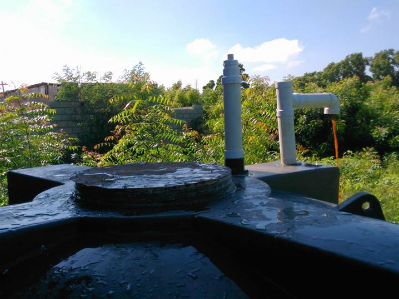 One Thousand Gallon Plastic Water Tank Digester in Haiti Solar CITIES