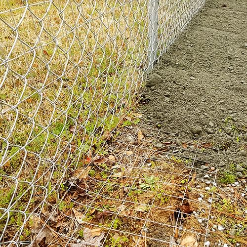 Secure A Chain Link Fence at the Bottom In 4 Ways [Pro Guide]