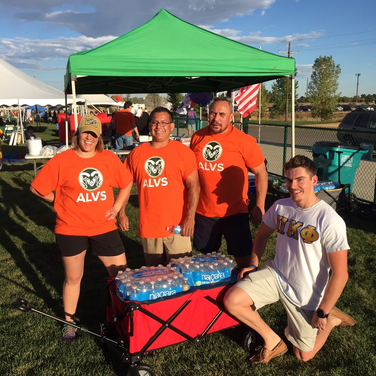 ALVS Serves helps to hydrate students at football games