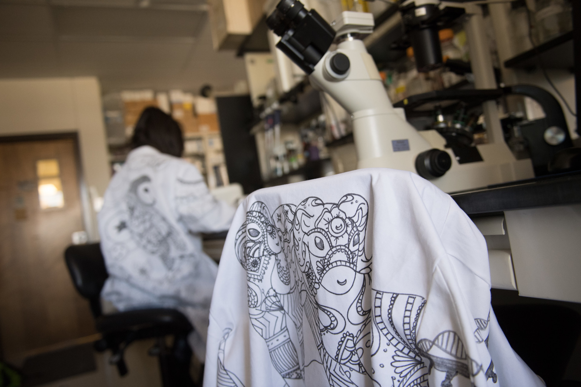 Microbiology student gives the white lab coat a makeover