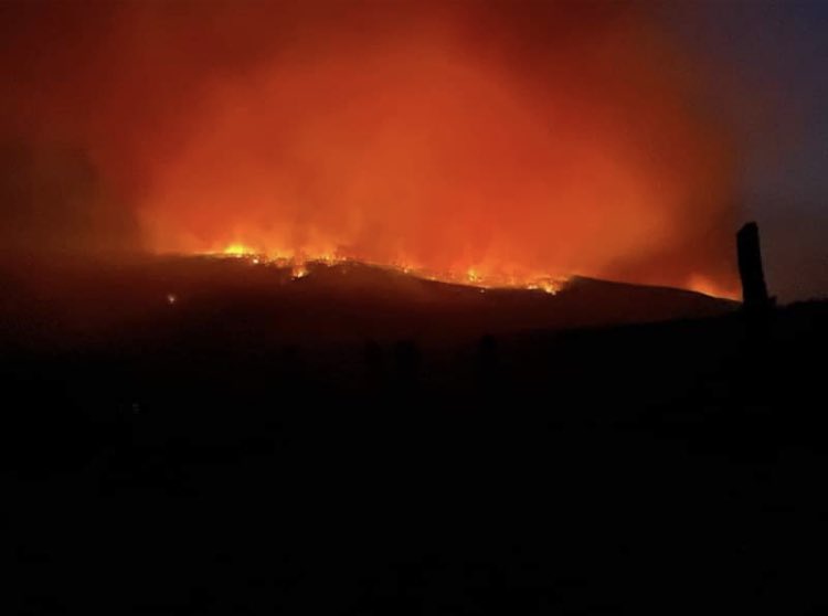 People flee their homes as massive fire approaches in northern New