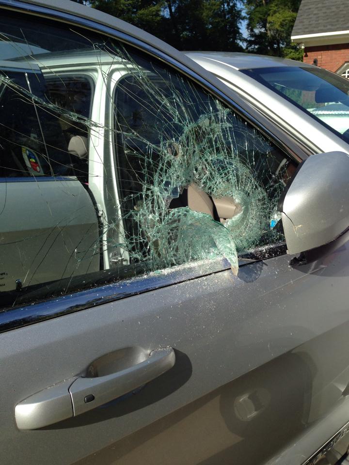 Someone using tool to bust out car windowshelp police catch the thief