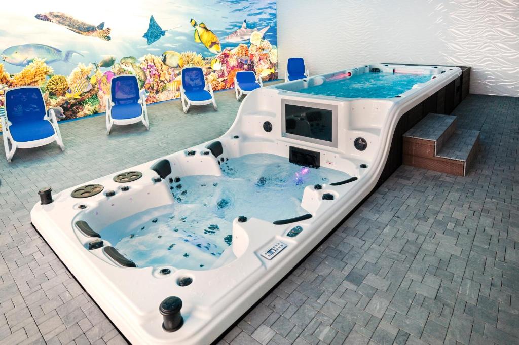 Hotele z Jacuzzi w Pokoju w Łodzi SpaSuites Apartamenty z Jacuzzi w