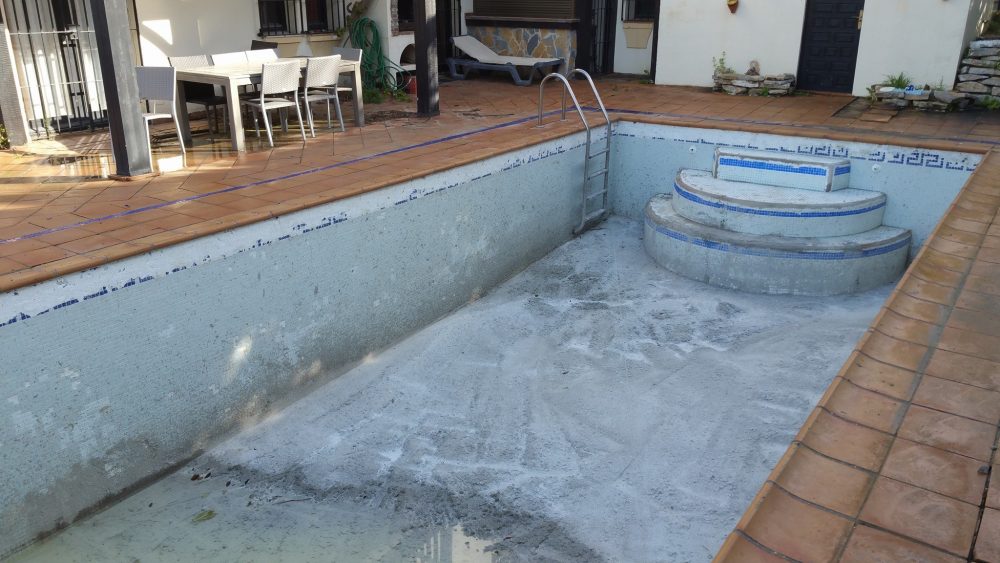 Very deep swimming pool made shallower and completely renovated
