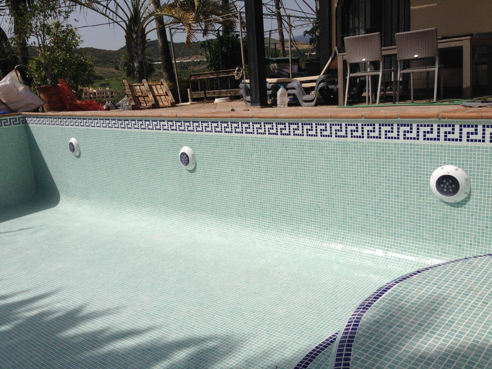Very deep swimming pool made shallower and completely renovated