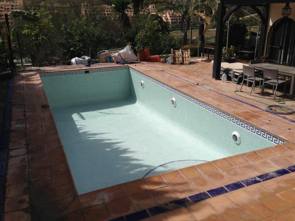 Very deep swimming pool made shallower and completely renovated