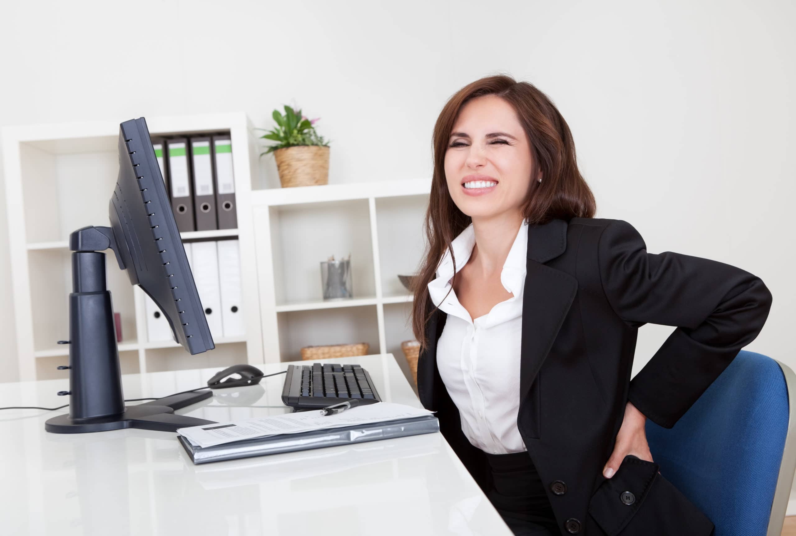 Back pain at Work How do you prevent it? Spine Surgeon Mr Mangattil