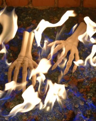 Fire Logs That'll Make Your Fire Pit Extra Creepy This Halloween