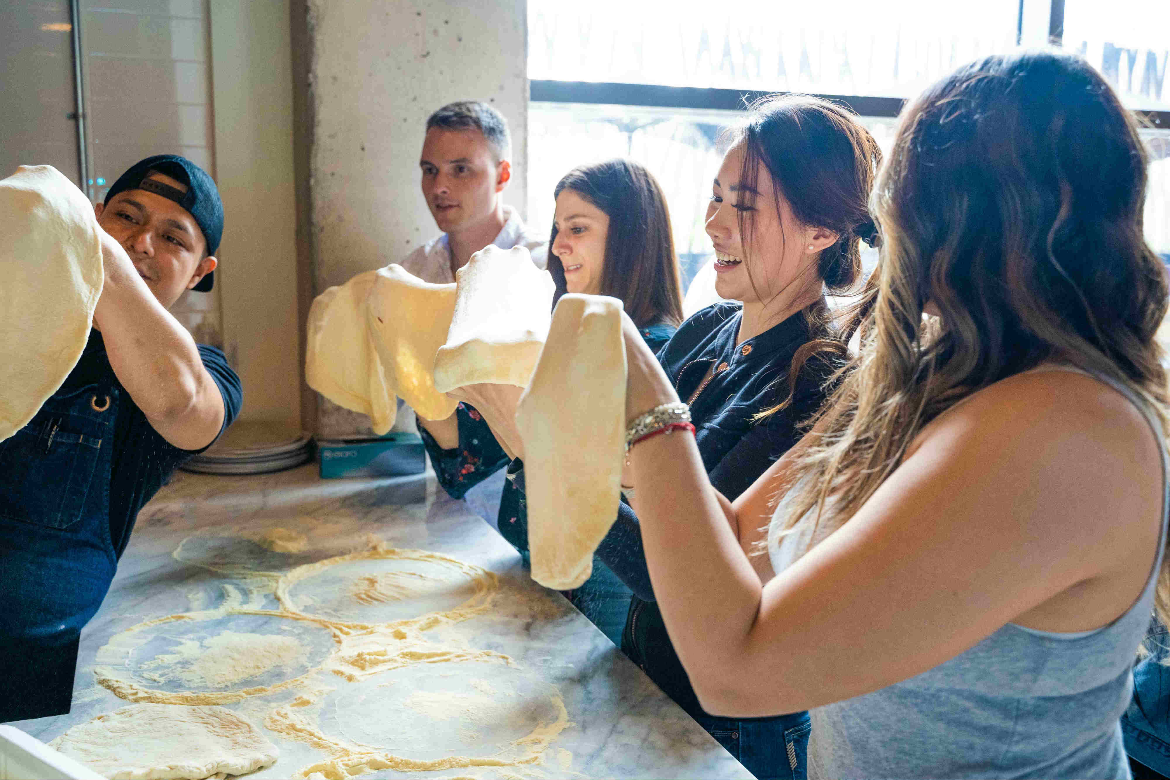 Make Neapolitan Pizza & Drink (Bottomless) Wine at Kesté Fulton