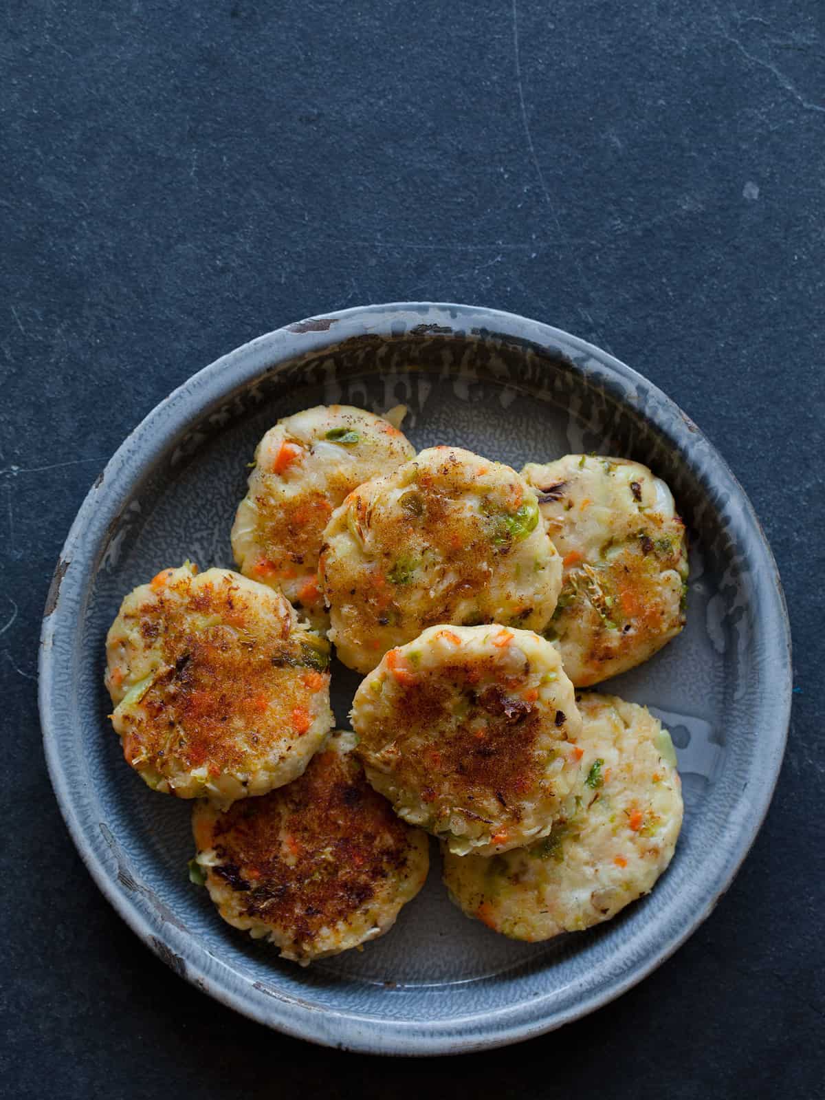 Bubble & Squeak with Bangers Spoon Fork Bacon