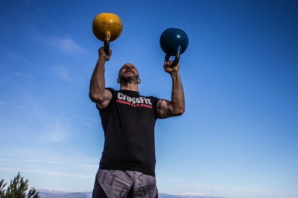 Why Do Kettlebells Feel Heavier Than Dumbbells? (Here's 5 Reasons Why)