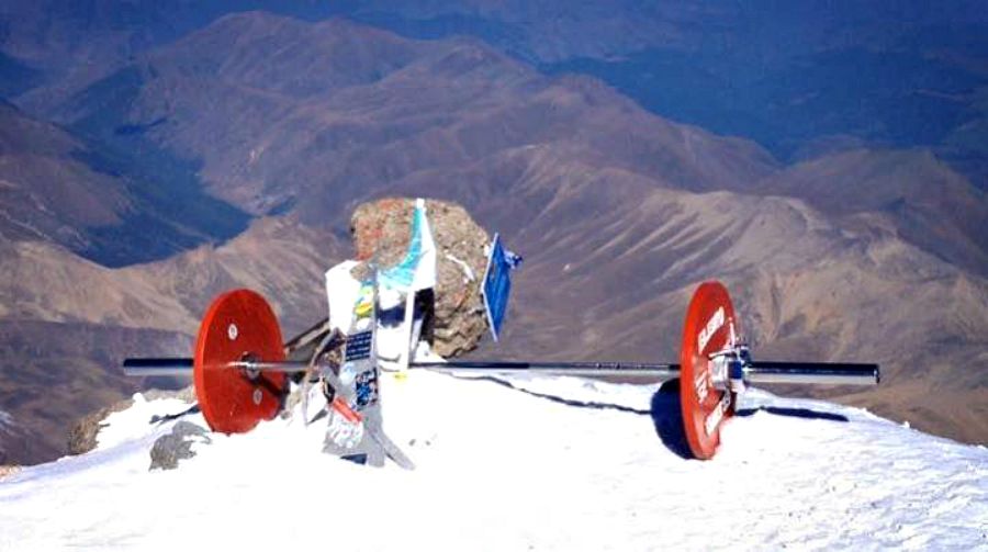 Powerlifter Climbs Mountain with 165lb Barbell