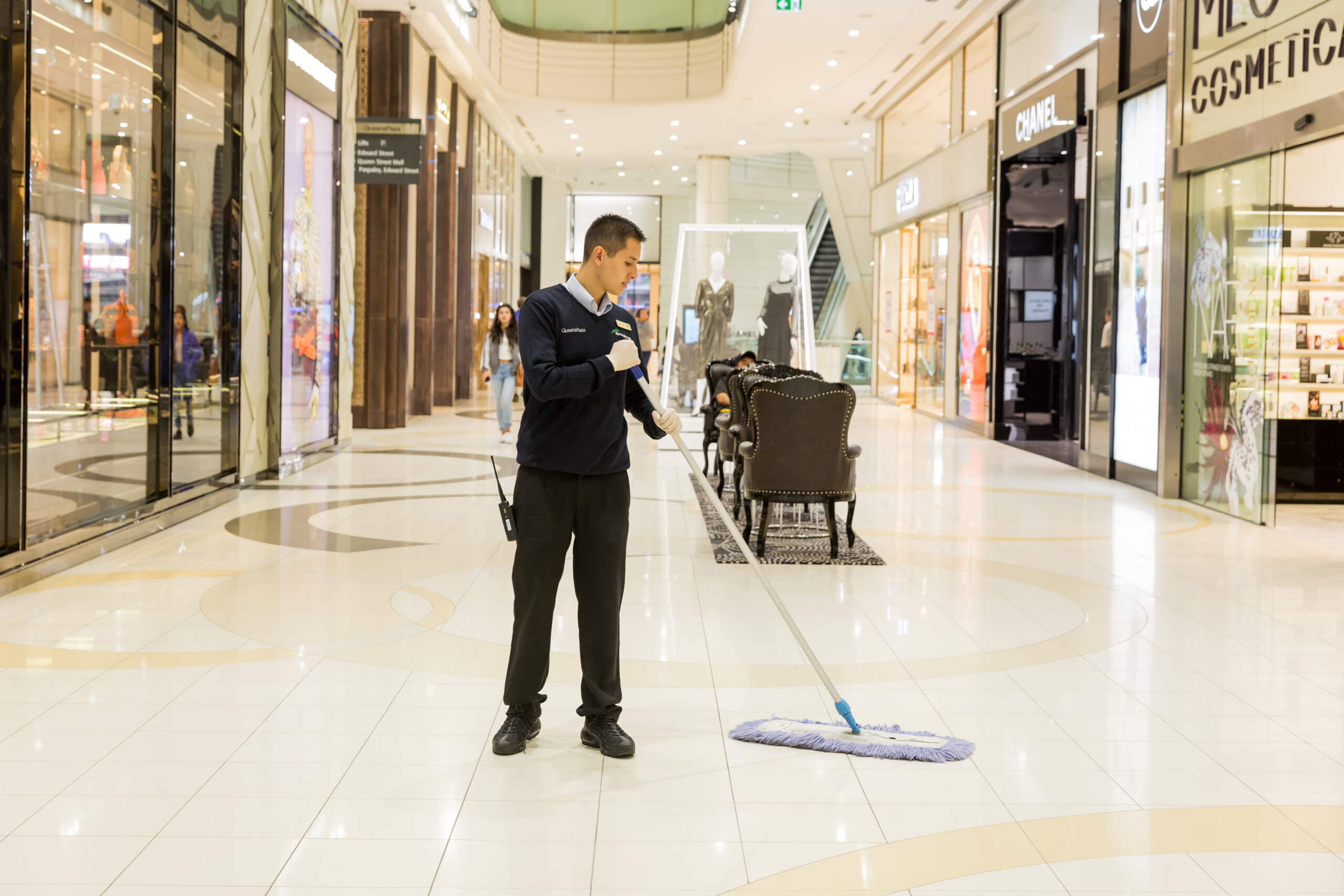 Man Mopping at Queens Plaza Mall Springmount Services Commercial