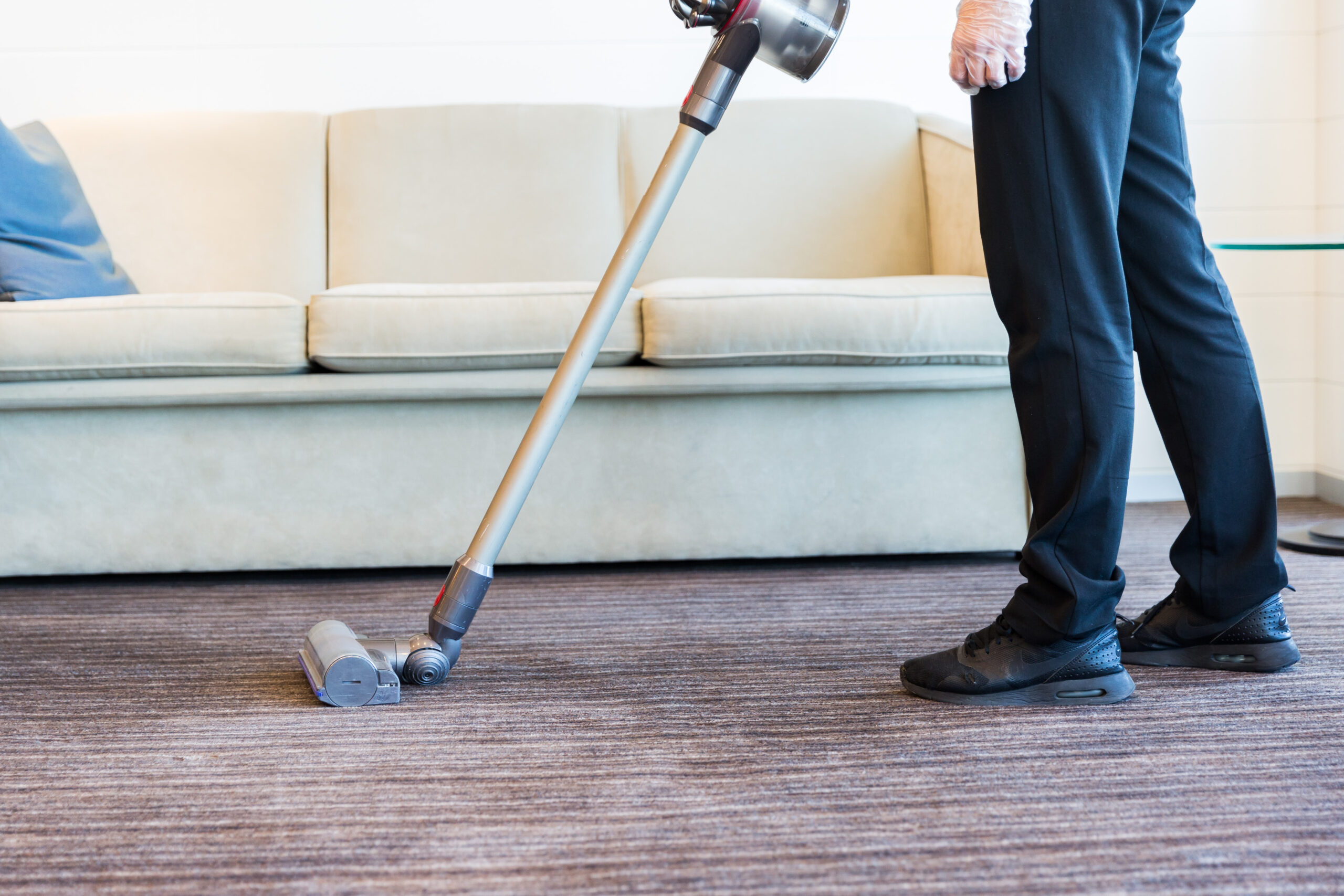 Vacuuming reception carpet Springmount Services Commercial & Retail