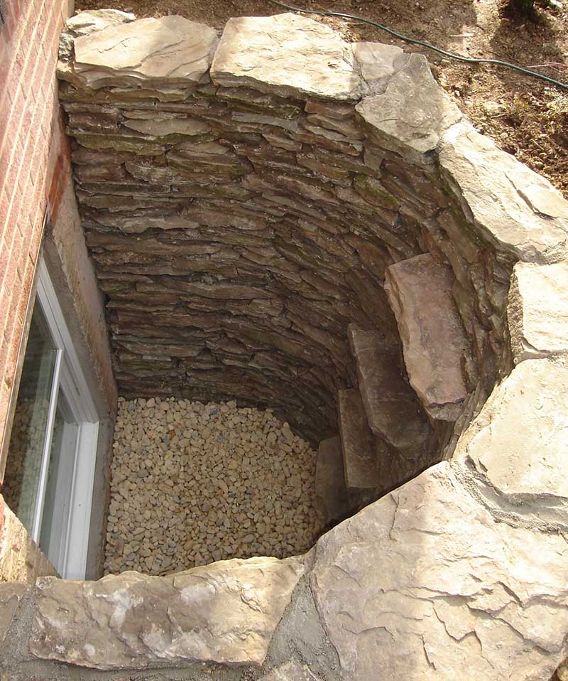 Stone Window Well Structural Repair & Renovations
